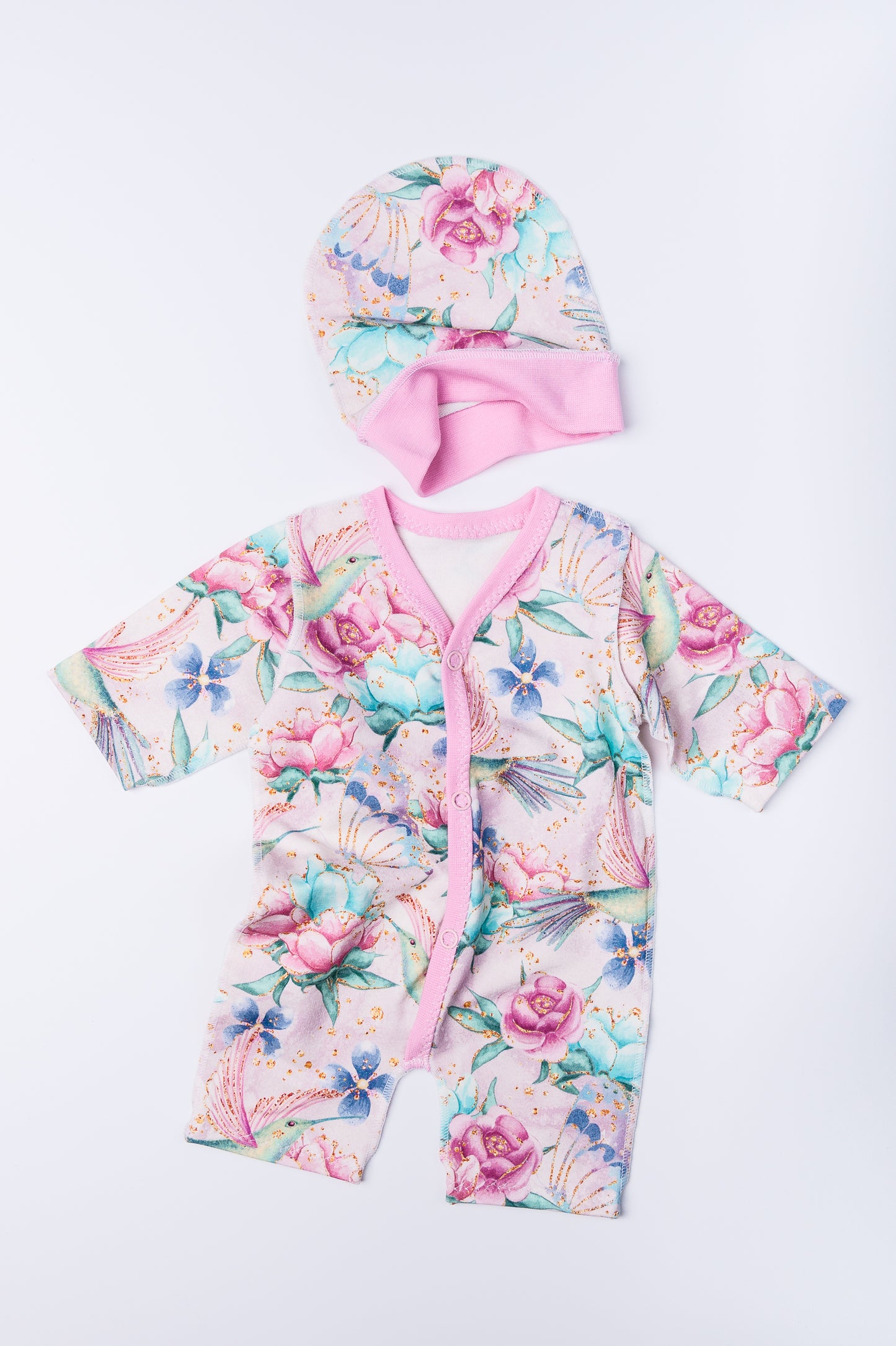 Komplektiņš “Ziedu sapnis” 44–46 — slīpiņš ar atvērtām rociņām un kājiņām