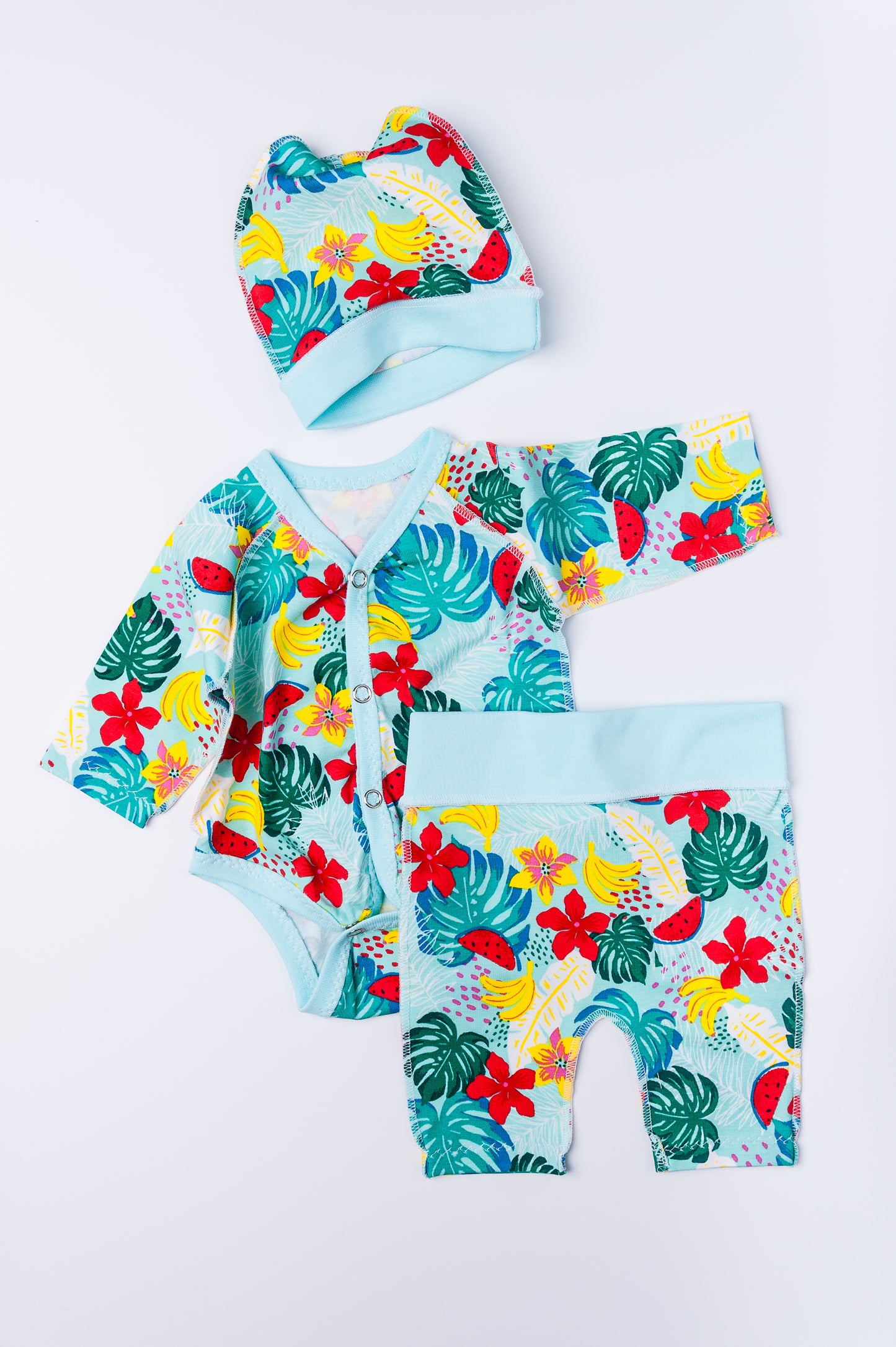 Komplekts “Tropu paradīze” 44–46 — bodijs, biksītes un cepurīte, kokvilnas trikotāža