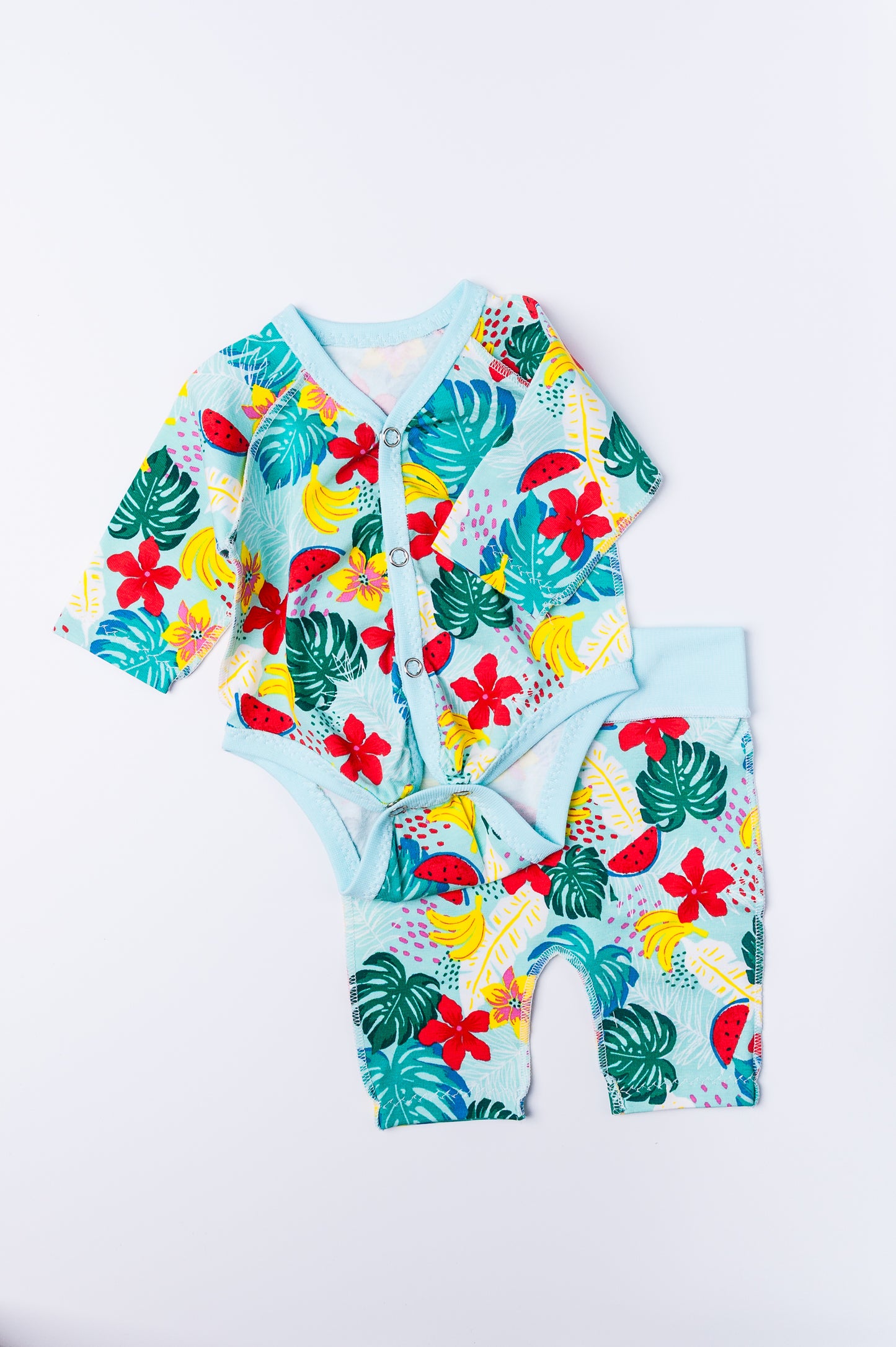 Komplekts “Tropu paradīze” 44–46 — bodijs, biksītes un cepurīte, kokvilnas trikotāža