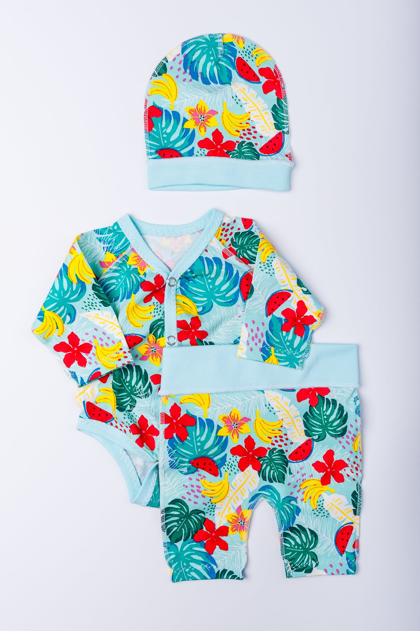 Komplekts “Tropu paradīze” 44–46 — bodijs, biksītes un cepurīte, kokvilnas trikotāža